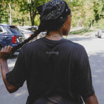 Reality Run Perspective Tee in Charcoal, back view