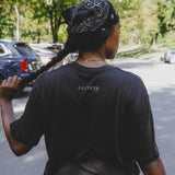Reality Run Perspective Tee in Charcoal, back view